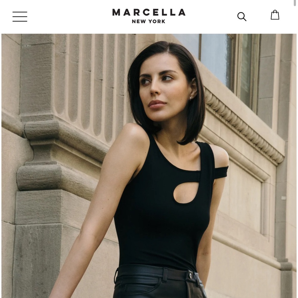 Marcella Noelle cut out off the shoulder edgy tank top